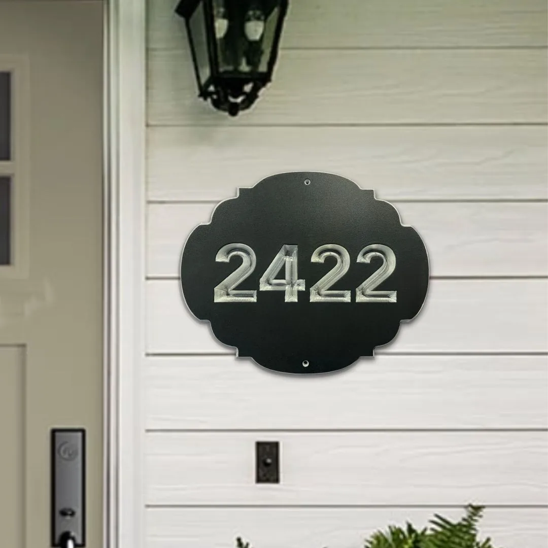 2422 address sign in silver on black beside a front door