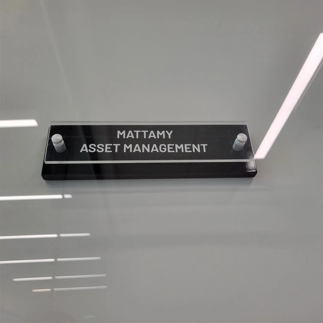 Acrylic department sign reading Mattamy Asset Management