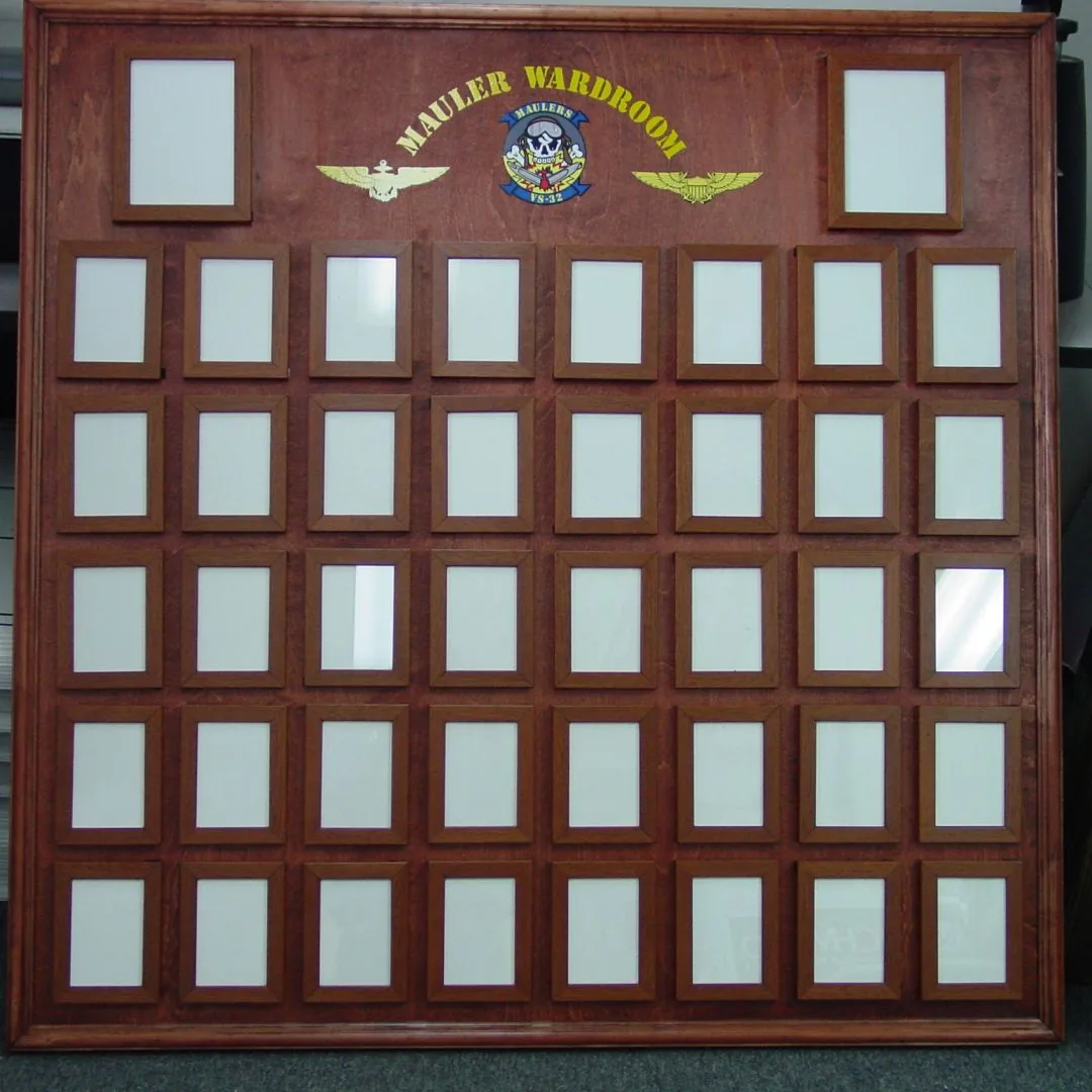 Mauler Wardroom plaque board with a squadron emblem and a grid of name plate slots