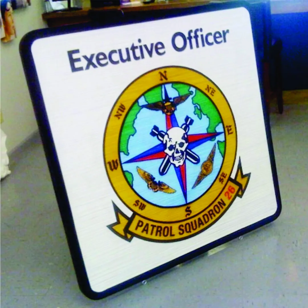 Routed Executive Officer sign with the Patrol Squadron 26 compass rose emblem, VP-26