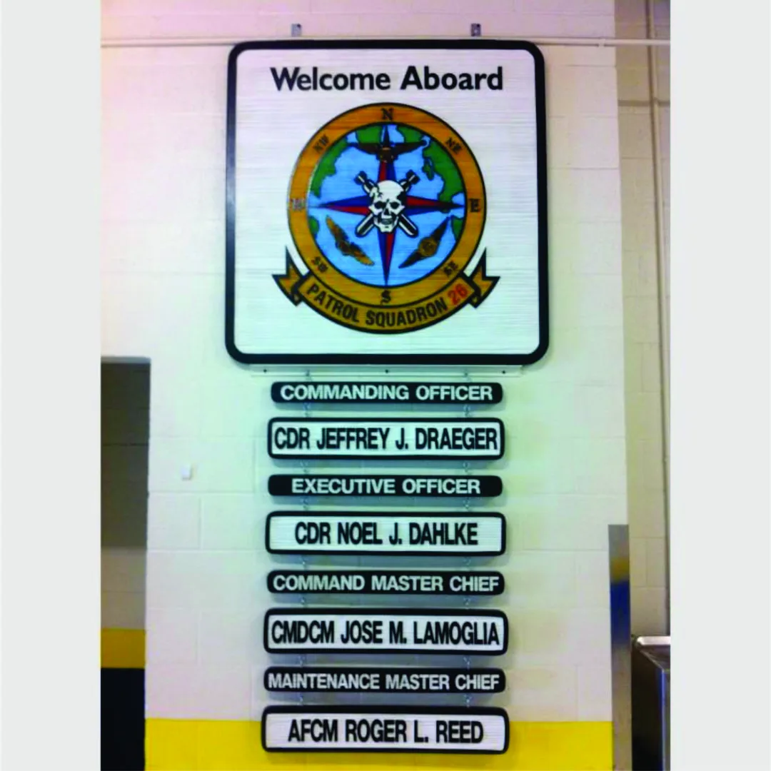 Welcome Aboard board with the Patrol Squadron 26 emblem above title and name plates for the commanding officer, executive officer and command master chief